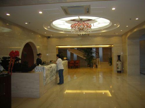 Dong Yuan Business Hotel Yantai Interno foto